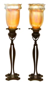 Tiffany Studios, A Pair of "Cat's Paw" Candlesticks with Favrile Glass Shades