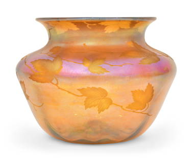 Tiffany Studios Intaglio Carved Favrile Glass "Leaf & Vine" Vase: Tiffany Studios"Leaf & Vine" Vasecirca 1910intaglio carved favrile glassengraved "L.C. Tiffany - Favrile, 1823"6 x 8 inchesProvenance: Property from an Important West Coast CollectionOther N