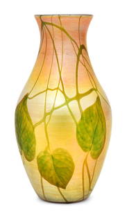 Tiffany Studios Intaglio Carved Favrile Glass "Leaf & Vine" Vase: Tiffany Studios"Leaf & Vine" Vasecirca 1915intaglio carved favrile glassengraved "L.C. Tiffany - Favrile, 6085L"9 x 5 inchesProvenance: Property from an Important West Coast CollectionOther