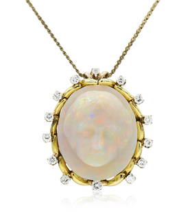 12K Yellow Gold, Opal & Diamond Brooch/Pendant Necklace: 12K Yellow Gold, Opal & Diamond Brooch/Pendant Necklace • featuring an opal cameo measuring approximately 24.50 x 20.58 x 8.30 mm • accented by round brilliant diamonds weighing a total