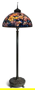 Century Studios Leaded Glass Magnolia Floor Lamp: Century Studios Leaded Glass Magnolia Floor Lamplate 20th centuryshade signed by Century Studios, base with spurious signature78 1/2 x 28 1/2 inchesProvenance: The Collection of Hassan Basagic, Hunter