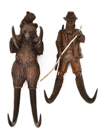 Two Black Forest Carved Whip Hooks