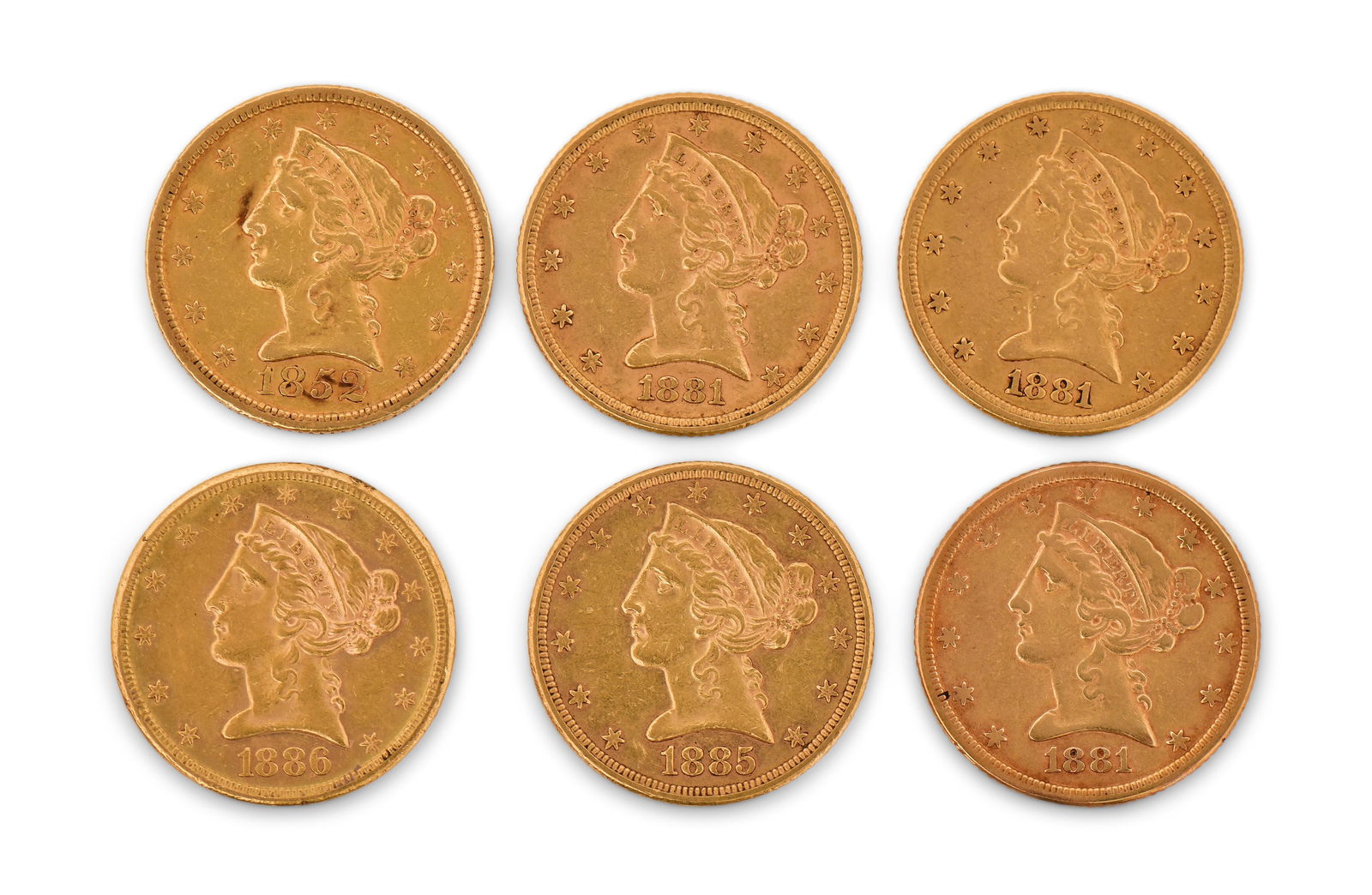 Six American Liberty Head $5 Gold Coins, 1885, 1881, 1886S, 1881, 1881 & 1852