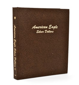 26 American Silver Eagle Coins in Book