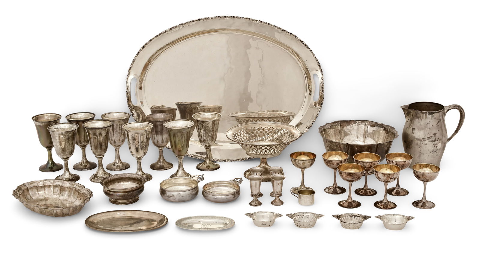 Lot of Sterling Silver Pieces: Lot of Sterling Silver Pieces20th century23 1/2 x 17 3/4 inches (tray)4 3/4 x 9 1/4 inches (larger bowl)7 1/2 x 7 1/2 x 5 inches (pitcher)212.18 troy ounces