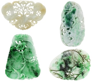 Group of Four Carved Jade Pendants