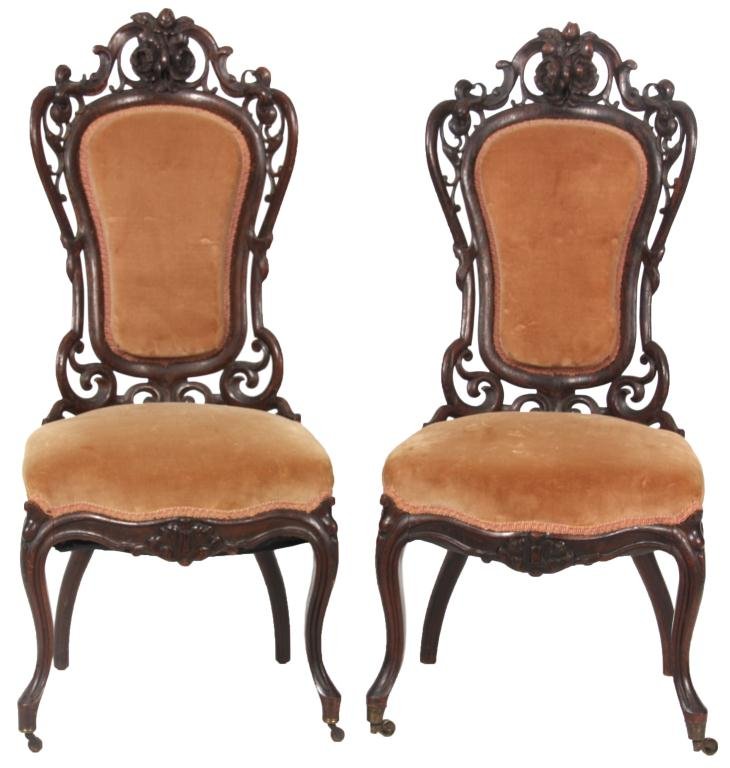 Pr. Laminated Rosewood Sidechairs: Pr. Laminated Rosewood Sidechairs Attr: J.H. Belter. Pierced carved back with elegant scroll work; opposite facing open flowers on the crest, carved cartouche on the seat rail and cabriole legs. Origi
