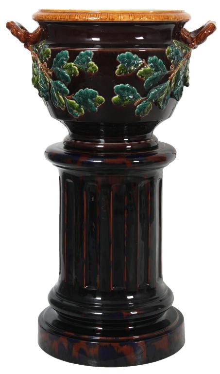 Sarreguemines Pottery Majolica Jardiniere: Sarreguemines Pottery Majolica Jardiniere & Pedestal. Large jardiniere with oak branch handles and an oak leaf & acorn pattern on the sides; has a deep brown glaze and a fluted pedestal. Signed Sarreg