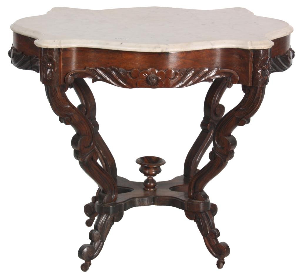 Rosewood Turtle Top Marble Top Table: Rosewood Turtle Top Marble Top Table. White turtle shaped marble top; veneered serpentine apron has leaf & floral carvings, stands on serpentine and scrolled legs, carved stretcher and turned center b