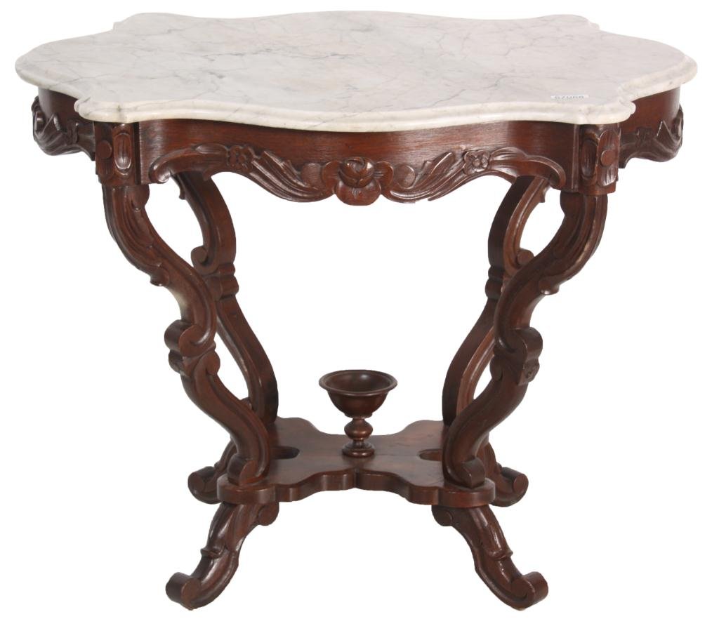 Rosewood Turtle Top Marble Top Table: Rosewood Turtle Top Marble Top Table. White turtle shaped marble top; veneered serpentine apron has leaf & floral carvings, stands on serpentine and scrolled legs, carved stretcher and turned center b