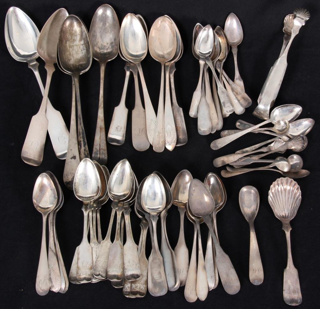 63 Pcs. Odd Coin Silver: 63 Pcs. Odd Coin Silver. Set includes 62 spoons and one set of tongs. Total weight 42.4 oz.