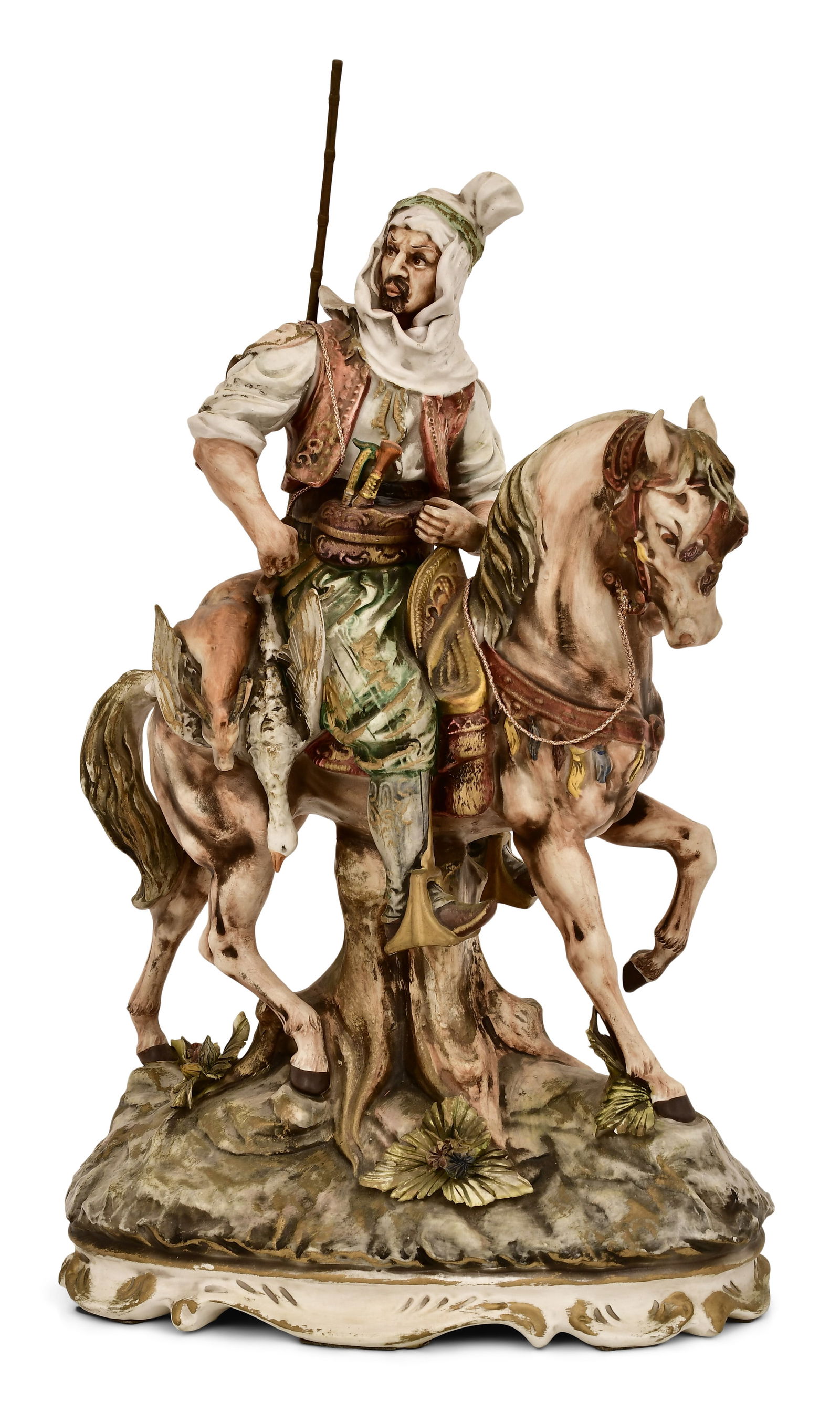Capodimonte Porcelain Figure of a Man on Horseback: Capodimonte Porcelain Figure of a Man on Horseback19th centurydepicting an Arab hunter on horseback with his swords in his belt, rifle slung over his shoulder, deer and goose draped over the horses ba