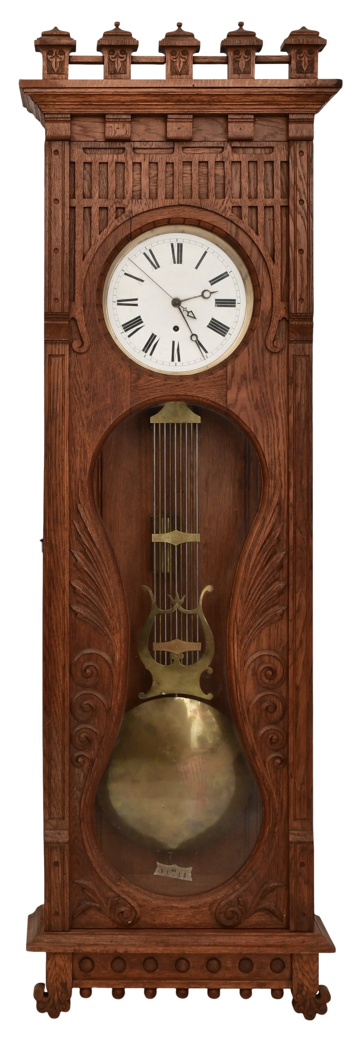 An Oak Jeweler's Pinwheel Wall Regulator Clock: An Oak Jeweler's Pinwheel Wall Regulator ClockSwiss movement, late 19th centuryoak case carved door and dentil molding crest, 8-day weight driven pinwheel escapement movement with brass lyre pendulum,