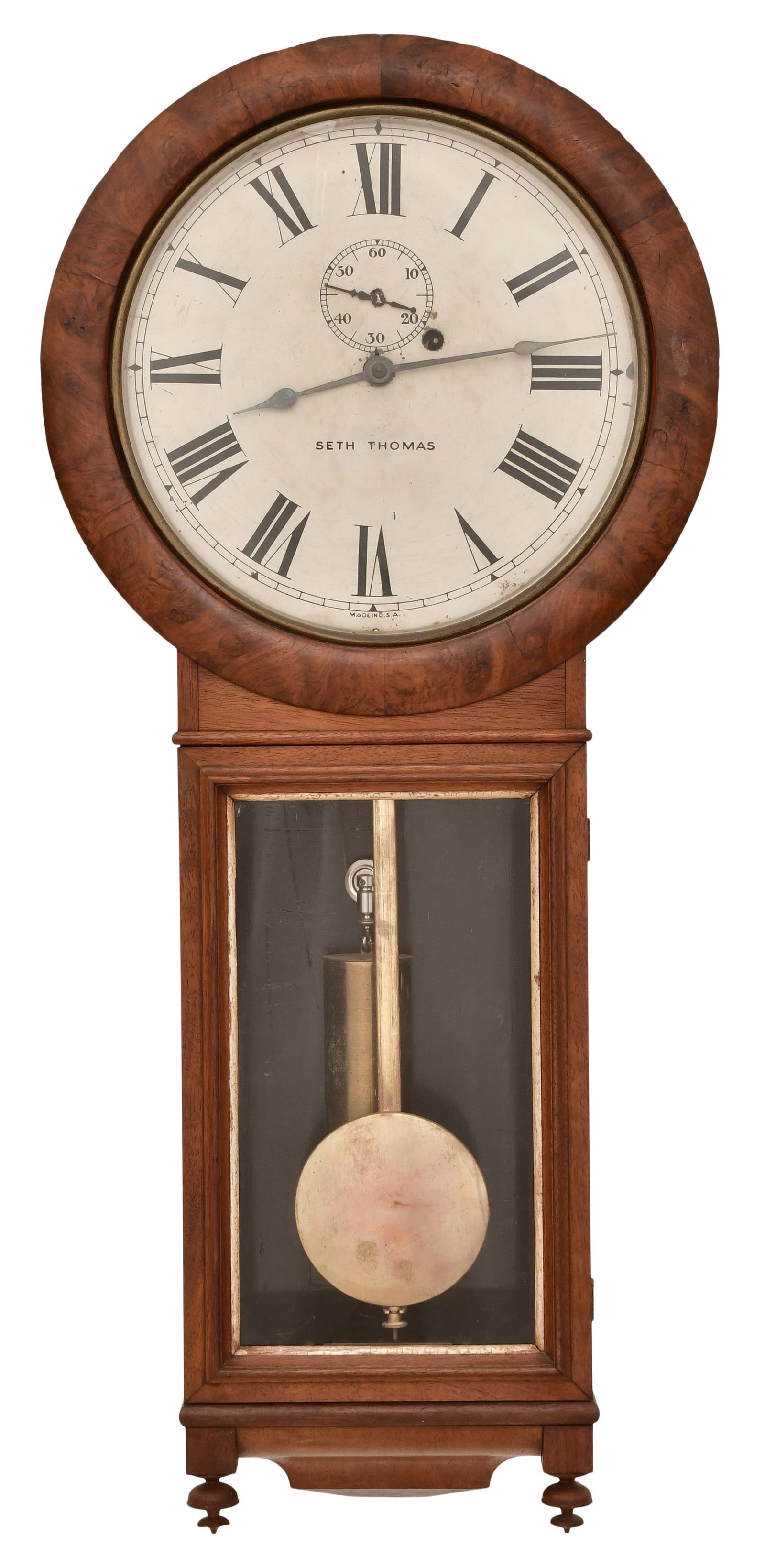 Seth Thomas "Regulator No. 1" Wall Clock: Seth Thomas "Regulator No. 1" Wall Clocklate 19th centurywalnut case, Silas B. Terry design round 8-day weight-driven time-only movement, signed on the dial34 x 15 1/2 x 4 3/4 inchesProvenance: Privat