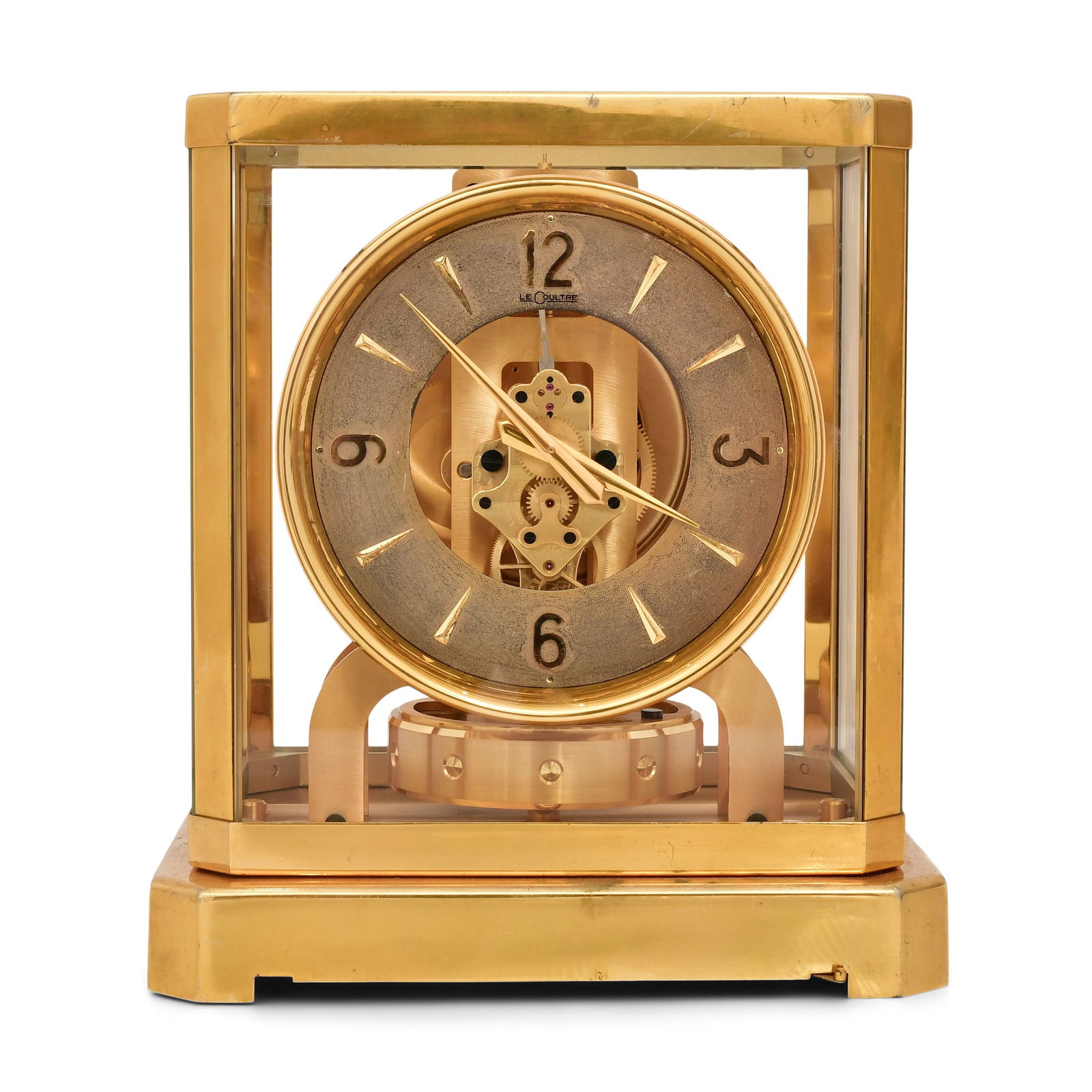 Jaeger-Lecoultre Atmos Clock, Caliber 519: Jaeger-Lecoultre Atmos Clock, Caliber 519circa 1950'sgold plated brass with glass panels, 15 jewel movement with atmospheric bellows winding motor, serial number 40192, movement and dial are signed by