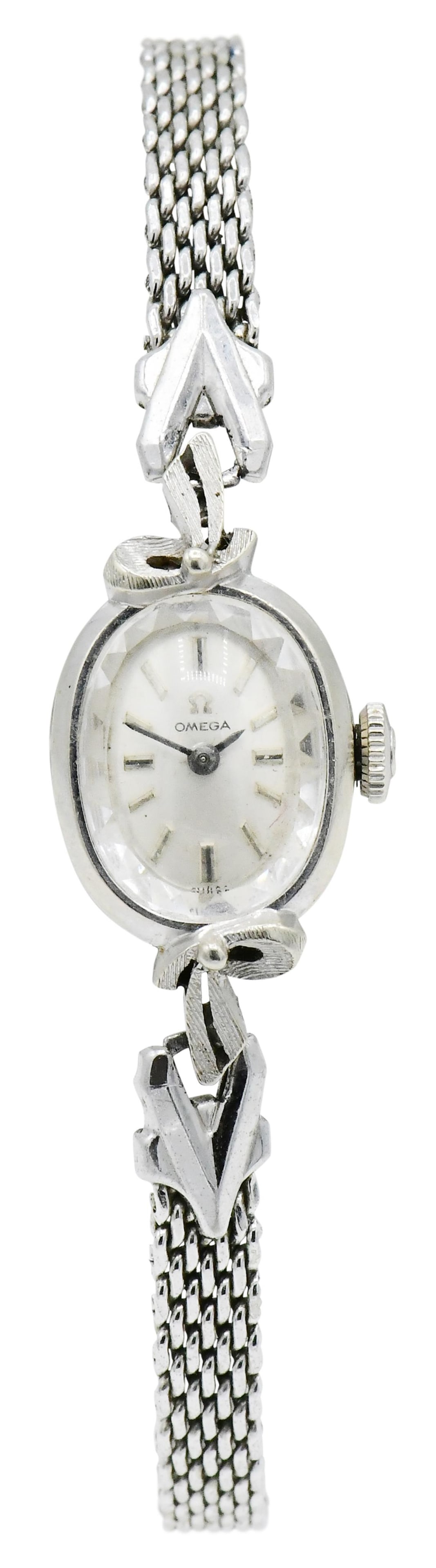 Omega 14K White Gold Wristwatch: Omega 14K White Gold Wristwatch Case Material: 14K white gold Case Dimensions: 30 x 14 mm Dial: silvered, applied baton hour markers, baton hands Movement: 17 jewels, unadjusted Signed: case, dial & m