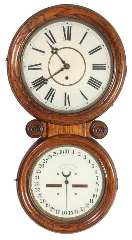 Waterbury Double Dial No. 34 Clock: Waterbury Double Dial No. 34 Wall Clock. 12 in. painted metal time dial with black Roman hour numerals and black hands, dial signed Manufactured by Waterbury Clock Co. U.S.A.; brass 8 day time only sp