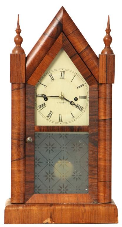 Jerome Double Fusee Clock: Rare Jerome Double Fusee Steeple Clock. Rosewood steeple shelf clock case has pointed crest with turned finials, frosted door glass and painted dial with raised chapter ring having black Roman hour nu