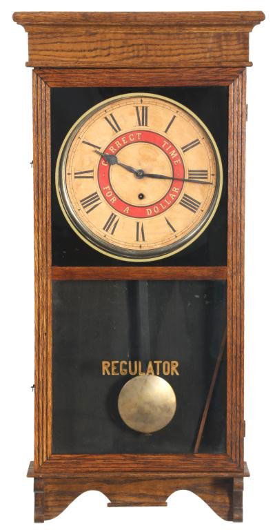 Oak Sessions Wall Regulator: Oak Sessions Wall Regulator. 12 in. paper dial has black Roman hour numerals on the chapter ring and red interior ring which reads Correct Time For A Dollar, has large black hands; 8 day brass, spring