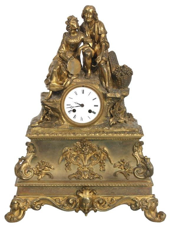 French Figural Bronze Mantle Clock: French Figural Bronze Mantle Clock. 3 in. porcelain dial has black Roman hour numerals, pierced black hands and bronze bezel, small chip next to the strike arbor hole; typical round French brass movem