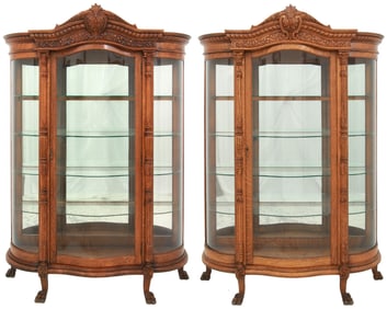 Pair of American Carved Oak Serpentine-Front China Cabinets