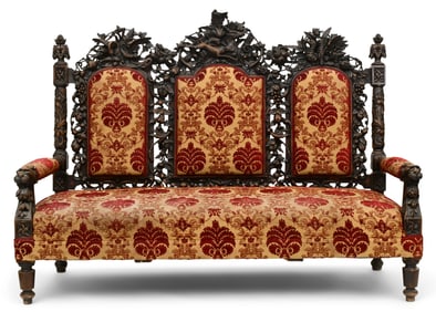 A Fine Italian Carved Walnut Sofa