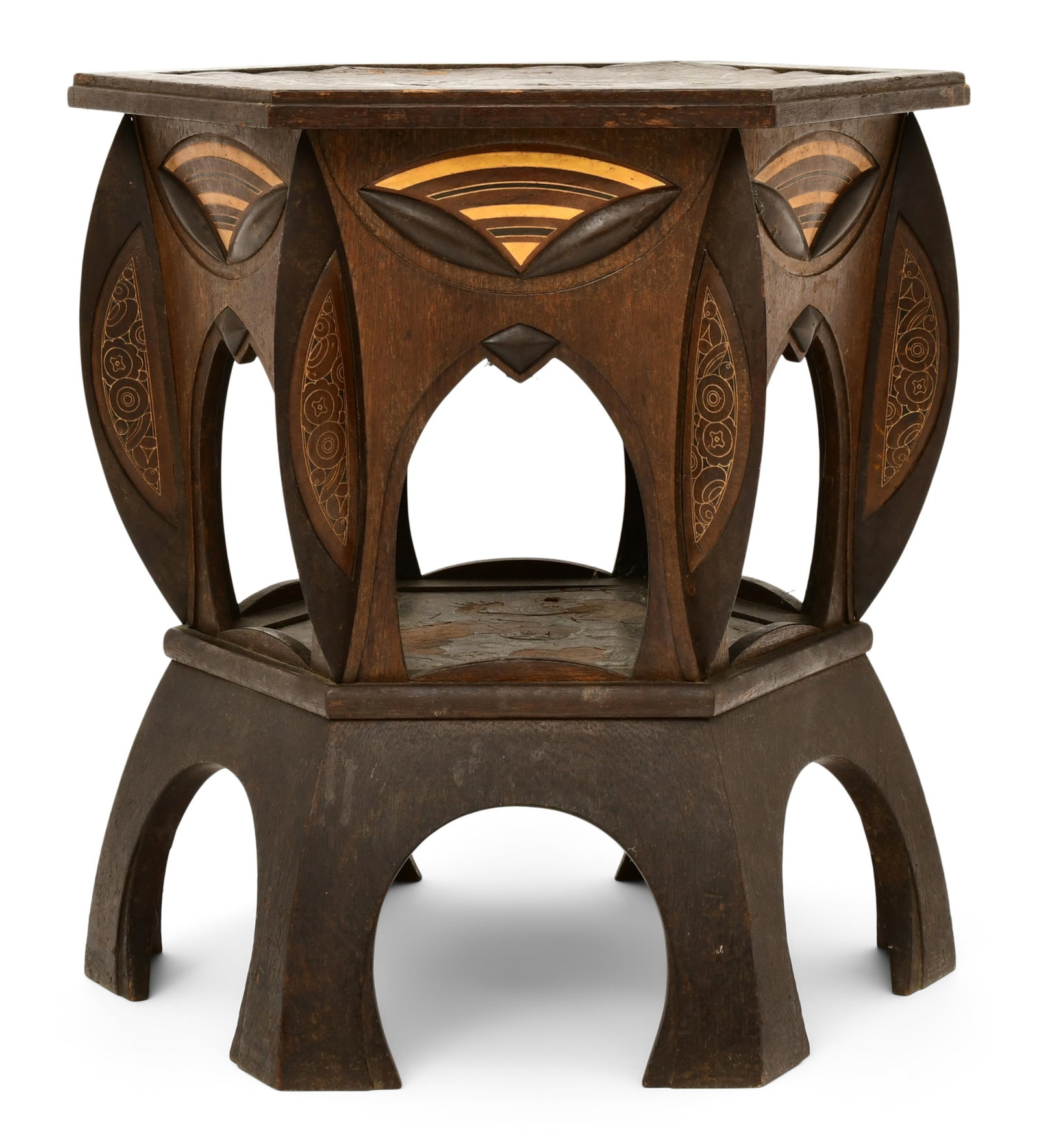 Arts & Crafts Oak & Tooled-Leather Table: Arts & Crafts Oak & Tooled-Leather Table early 20th century the table of hexagonal form and decorated with tooled-leather panels, the top with a perched crow amongst foliate, table with incised mark "