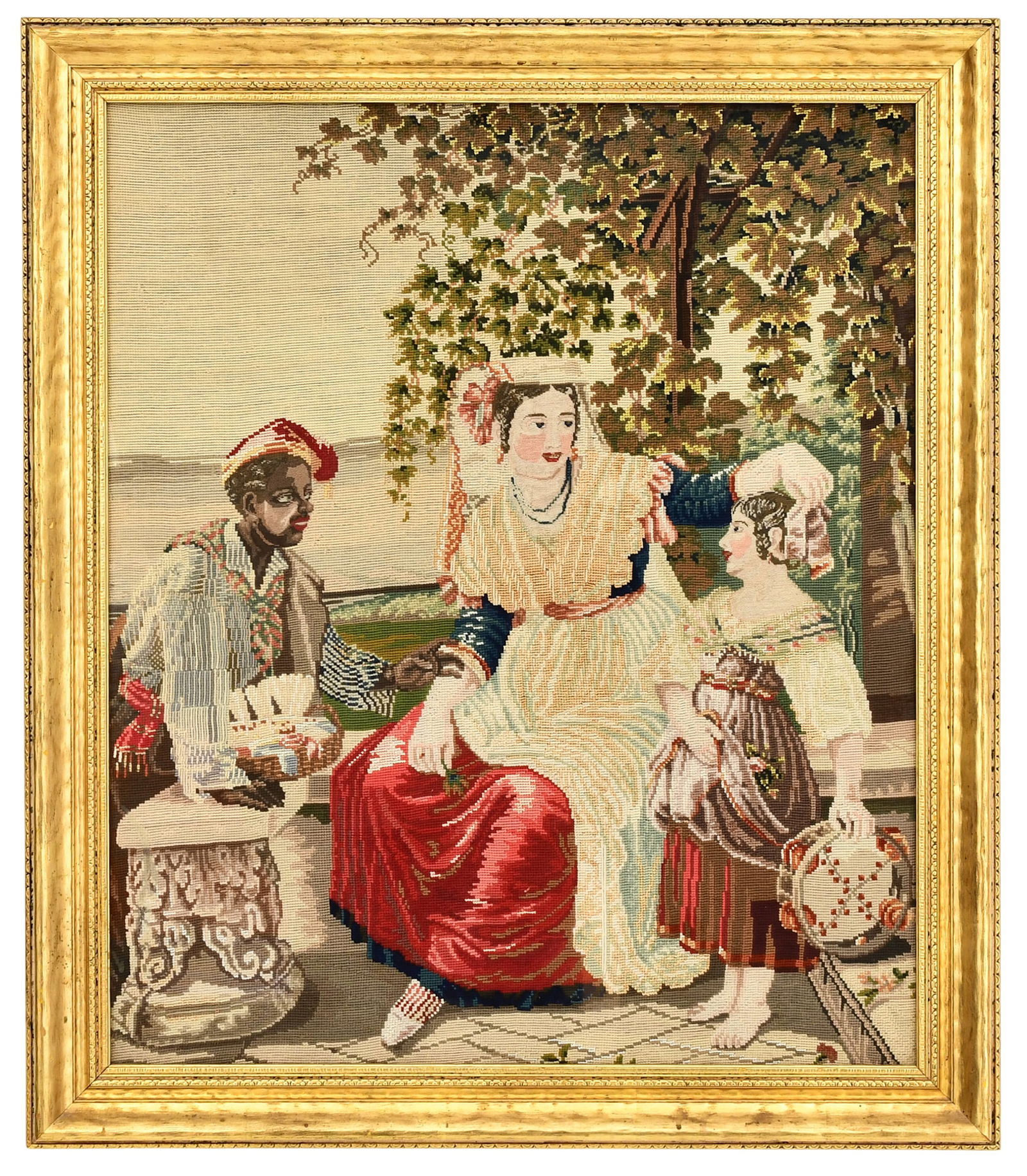 19th Century Genre Scene Needlepoint: 19th Century Genre Scene Needlepointdepicting three figures seated on a patio with a tree and landscape in the distance27 3/4 x 23 1/4 inches (sight)32 3/4 x 28 1/4 inches (frame)
