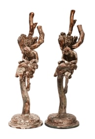 Pair of Silvered Clad Monkey Candlesticks