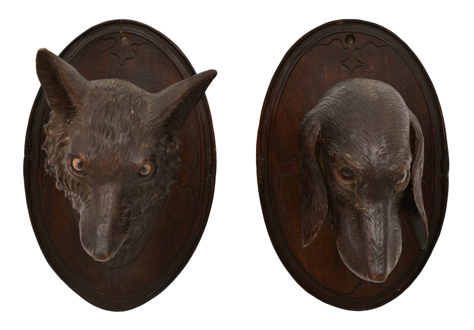 Black Forest Carved Wall Plaques of a Fox & Foxhound: Black Forest Carved Wall Plaques of a Fox & Foxhound late 19th century 11 x 7 1/2 x 6 1/2 inches