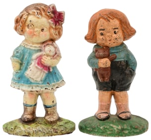 Two Cast Iron Children Doorstops