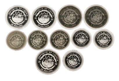 Lot of 11 Republic of Liberia Silver Coins, $20 (3), $10 (3) and $5 (5)