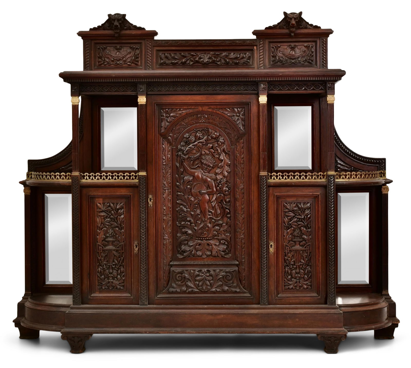 A Fine American Aesthetic Movement Rosewood Parlor Cabinet: A Fine American Aesthetic Movement Rosewood Parlor Cabinetcirca 1880the top decorated with two mythical animal heads, scrollwork, foliate and cartouche shields, above beveled glass mirrors and three d