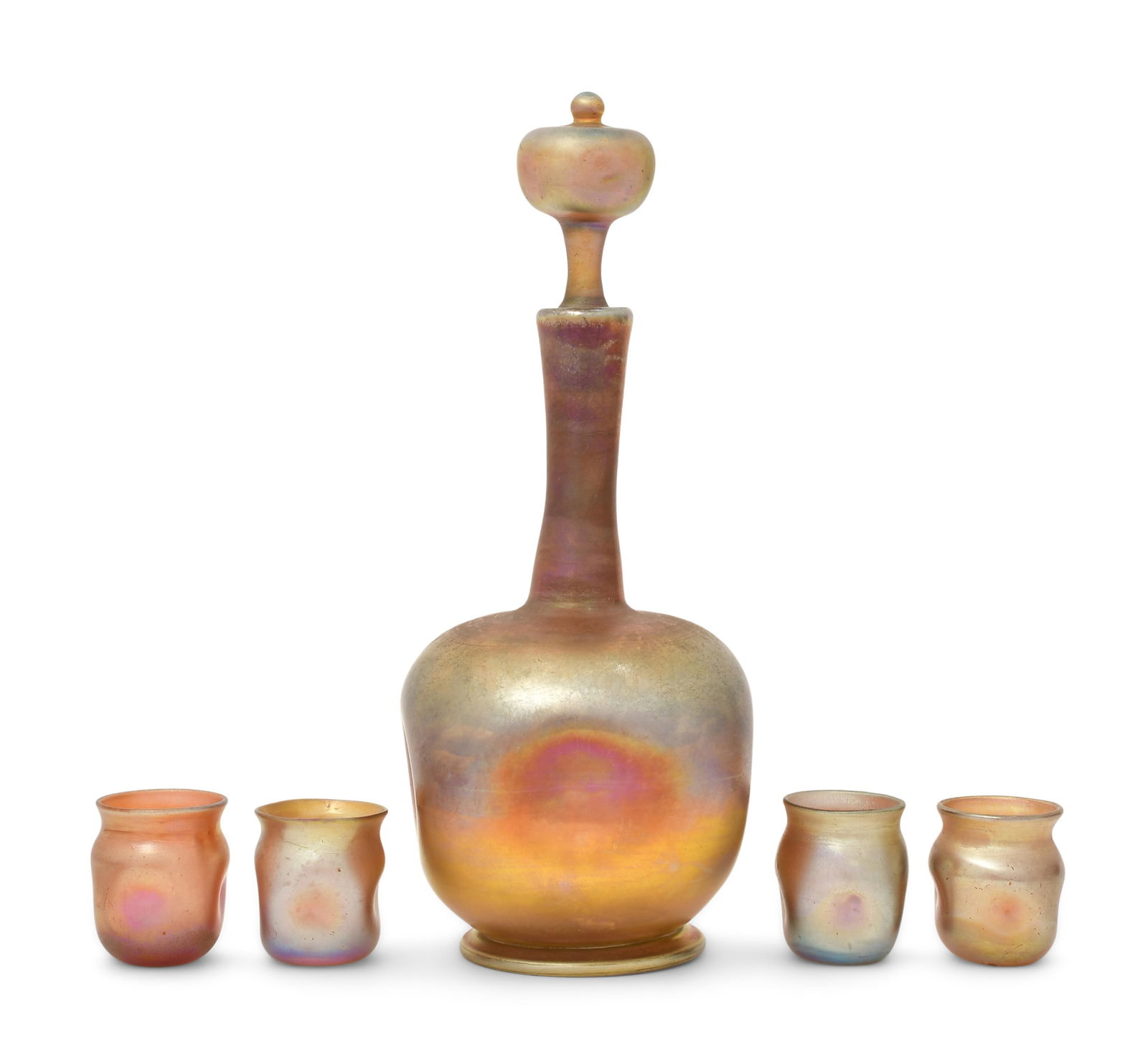 Tiffany Studios Favrile Glass Five-Piece Decanter Set: Tiffany Studios Five-Piece Decanter Set circa 1915 favrile glass decanter engraved "L.C. Tiffany - Favrile, 972" stopper engraved "972" each cordial engraved "L.C.T." and one numbered "Q6704" 9 1/2