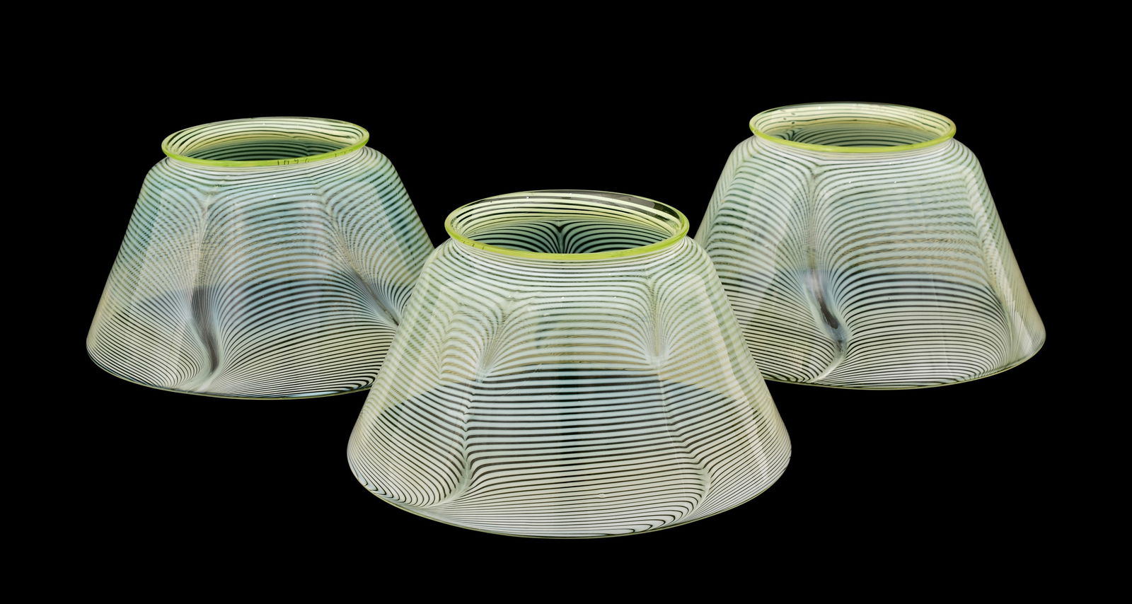 Tiffany Studios, Set of Three Decorated Shades: Tiffany Studios Set of Three Decorated Shades early 20th century favrile glass each engraved "L.C.T. / 2641" 4 x 7 1/2 inches Provenance: Private Collection, New York
