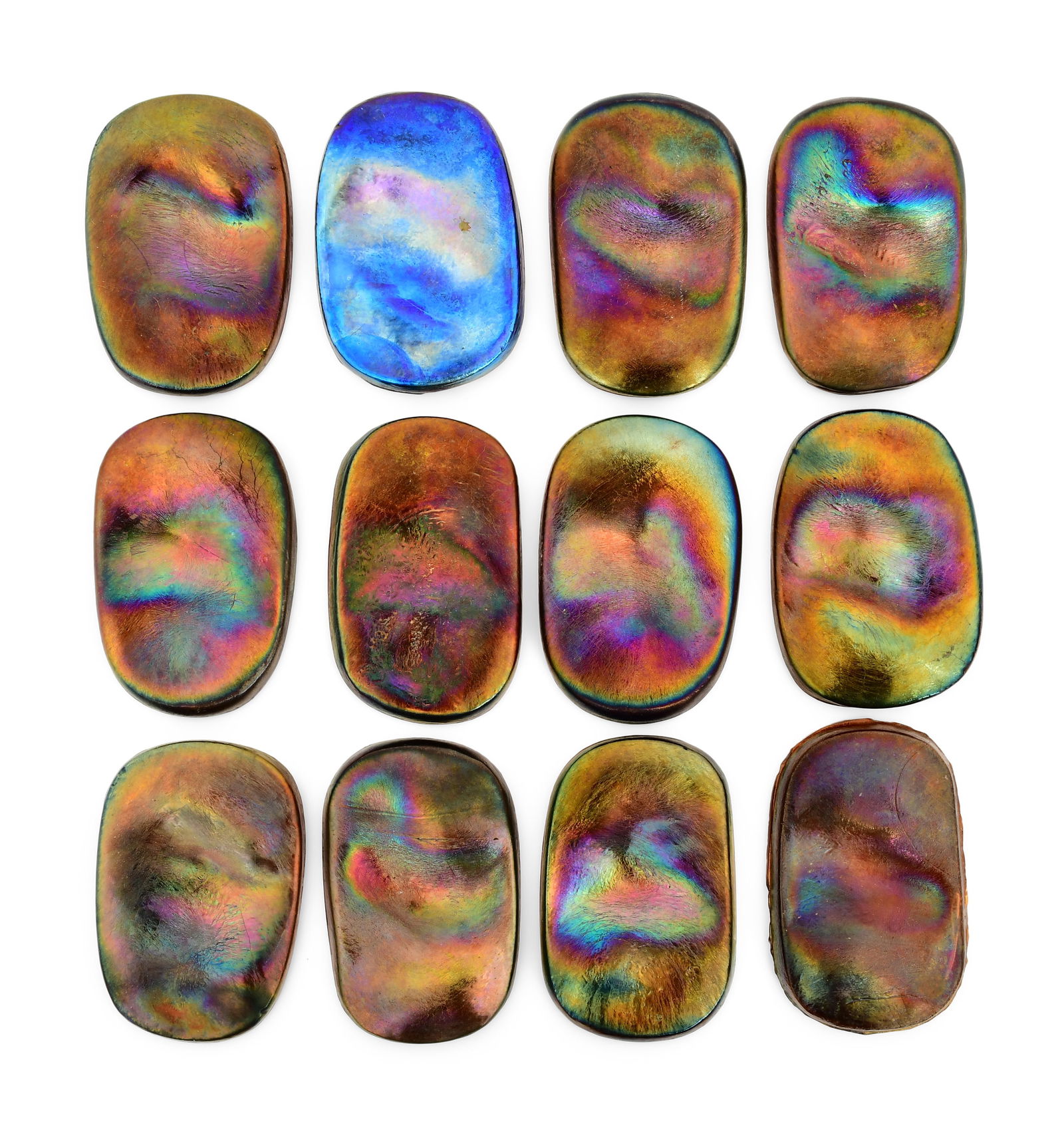 Tiffany Studios, Lot of 12 "Turtle-Back" Favrile Glass Tiles: Tiffany StudiosLot of 12 "Turtle-Back" Tilesearly 20th centuryfavrile glass4 x 2 5/8 inchesProvenance: Important Private CollectionOther Notes: Fontaine's Auction Gallery can arrange shipping for