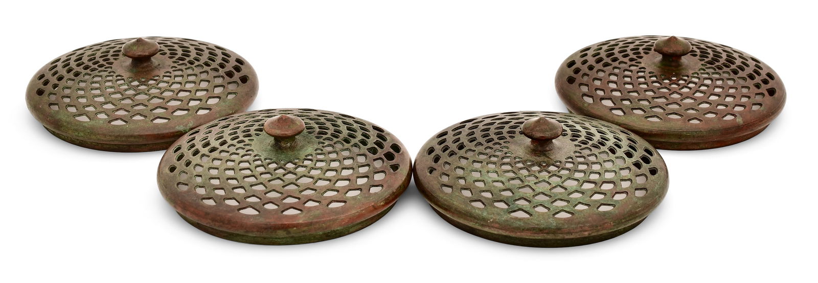 Tiffany Studios, Four Slip Heat Caps: Tiffany StudiosFour Slip Heat Capscirca 1910patinated bronze4 in. diameter 3 1/2 in. diameter (opening)Provenance: Important Private CollectionOther Notes: Fontaine's Auction Gallery can arrang