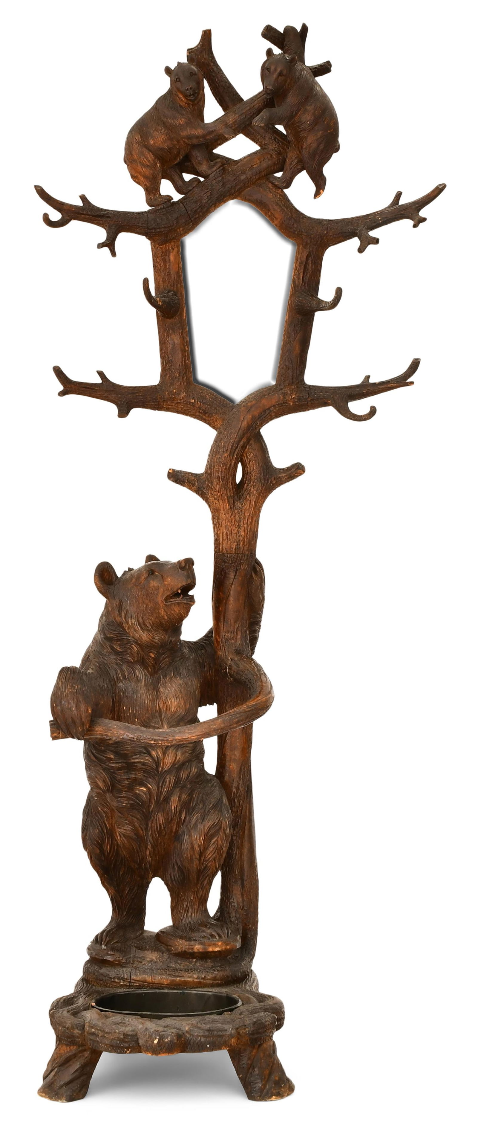 Black Forest Carved Wood Bear Hall Tree: Black Forest Carved Wood Bear Hall Treelate 19th centurythe large bear surmounted by two cubs and a beveled mirror, each with glass eyes80 x 32 x 21 inchesProvenance: Private Collection, Boston, Massa