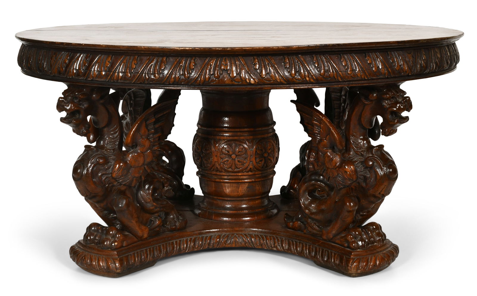 American Figural Carved Oak Dining Table with Winged Griffins: American Figural Carved Oak Dining Table with Winged Griffinslate 19th centurywith three leaves (11 3/4 x 60 inches)29 x 60 inchesProvenance: Private Collection, South Dakota