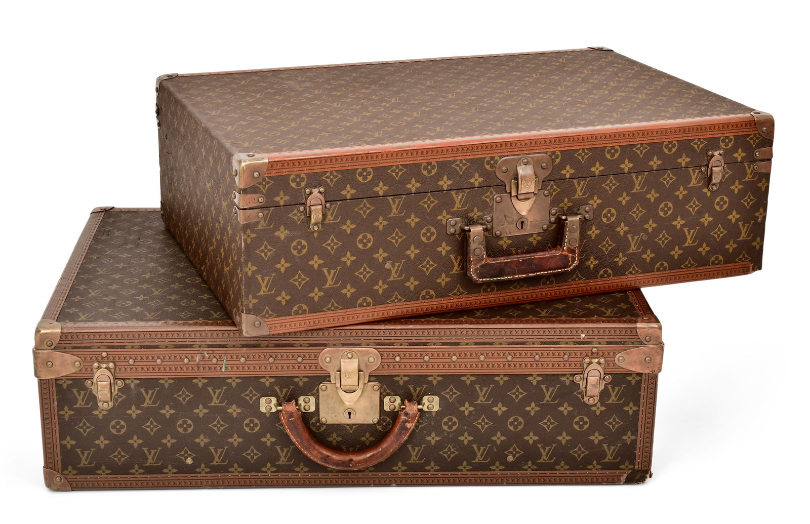 Two Louis Vuitton Monogram Suitcases: Louis Vuitton(Paris, founded 1854)Two Monogram Suitcasesearly 20th centuryprinted canvas, brass, leather19 3/4 x 30 x 8 1/2 inches (larger)18 1/2 x 27 3/4 x 8 1/2 inches (smaller)