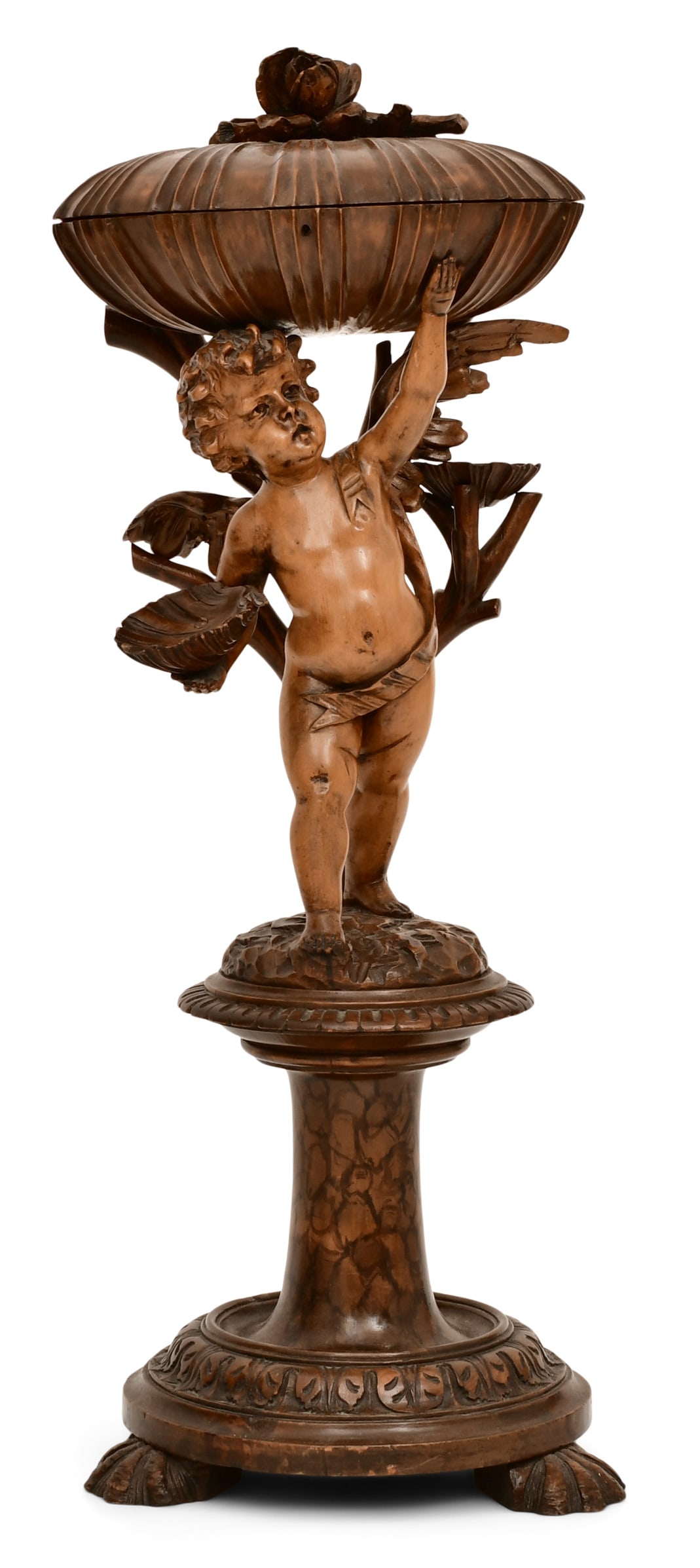 Italian Carved Walnut Figural Dressing Stand: Italian Carved Walnut Figural Dressing Stand late 19th century the cherub supporting a large carved clam shell with hinged lid set with a rose and opening to reveal a padded silk lined interior with