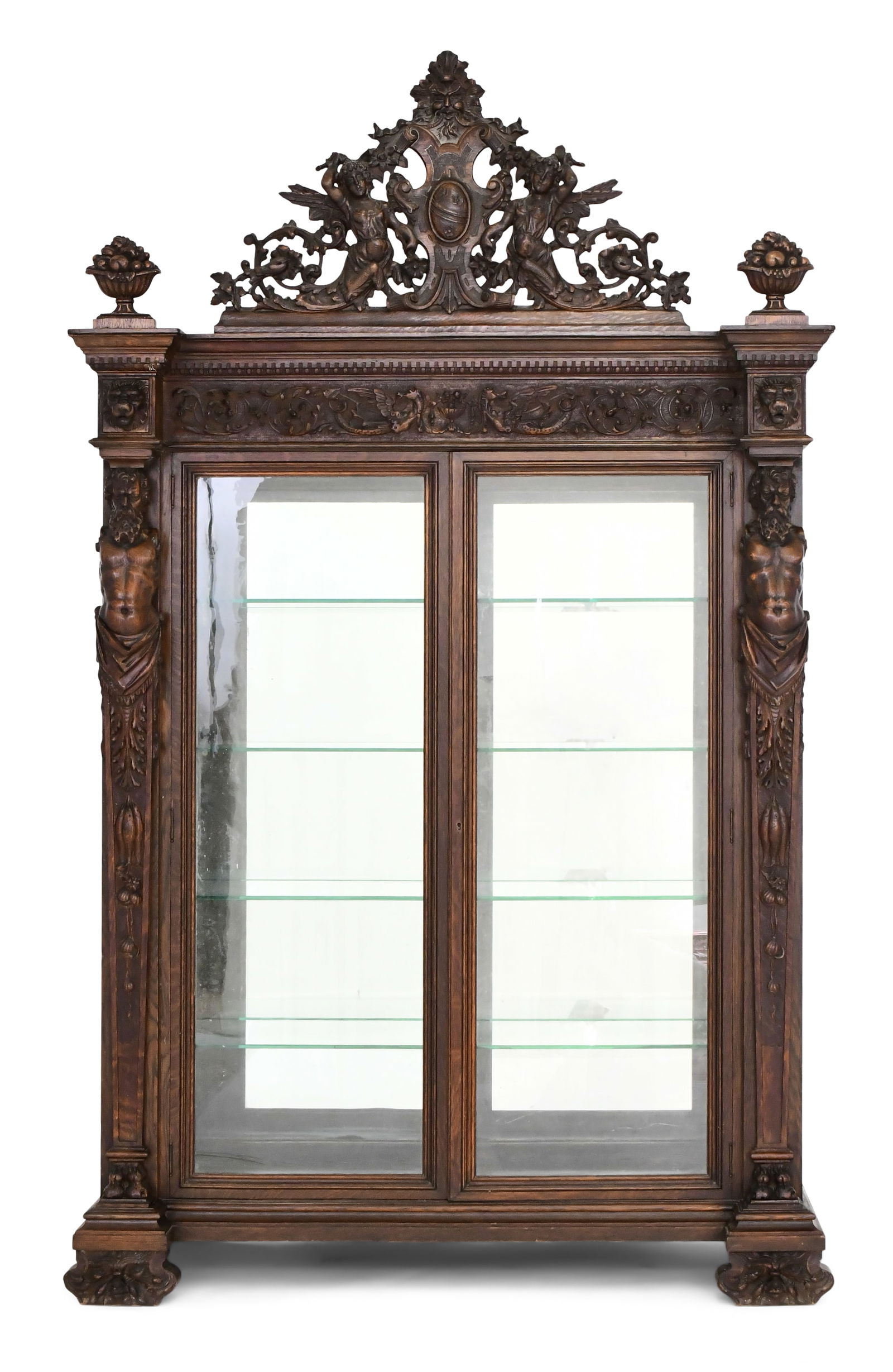 R.J. Horner & Co. Figural China Cabinet: R.J. Horner & Co. (New York, 1886-1915) Figural China Cabinet circa 1890 oak, glass numbered "1447" 94 1/2 x 57 x 21 inches The cabinet elaborately carved with winged maidens, Atlas figures, a