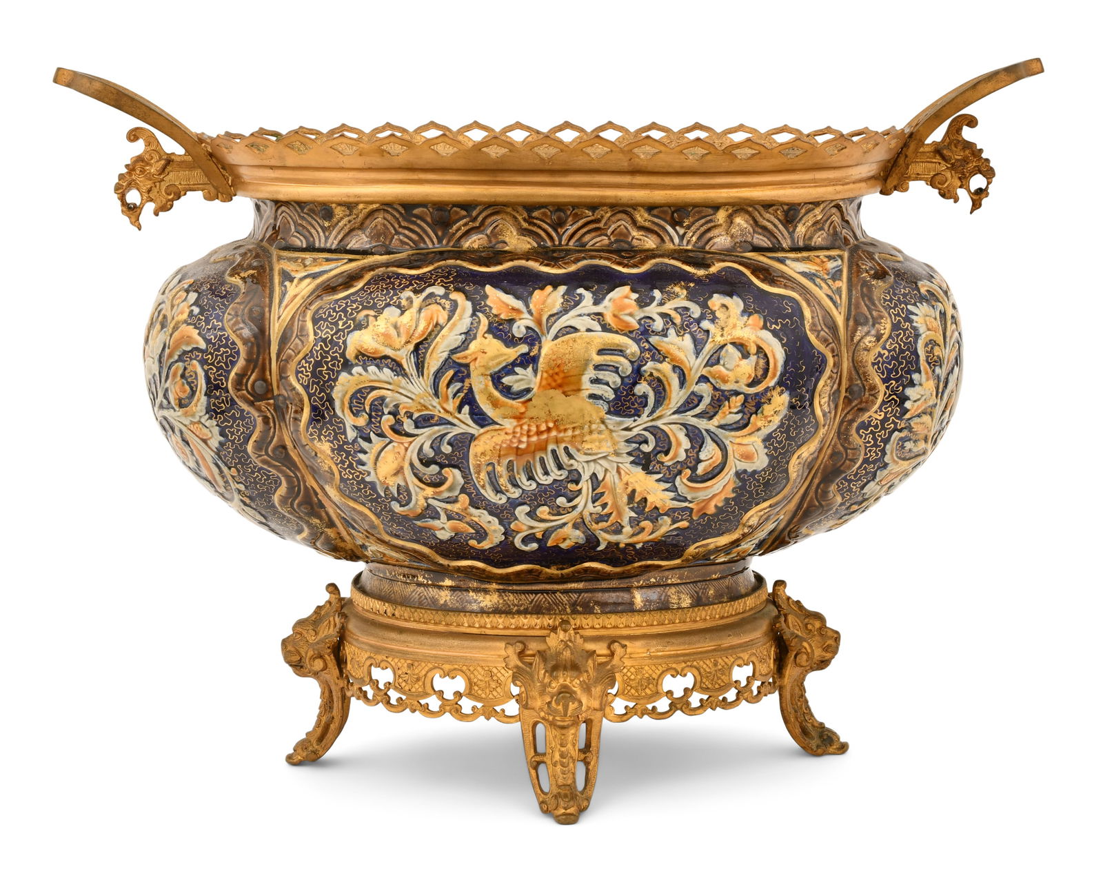 H. Boulenger & Cie Gilt Bronze-Mounted Porcelain Centerpiece: H. Boulenger & Cie Gilt Bronze-Mounted Porcelain Centerpiece late 19th century the body decorated with winged creatures and foliate, standing on four creature-head feet, marked "H.B. & Cie, Choisy Le