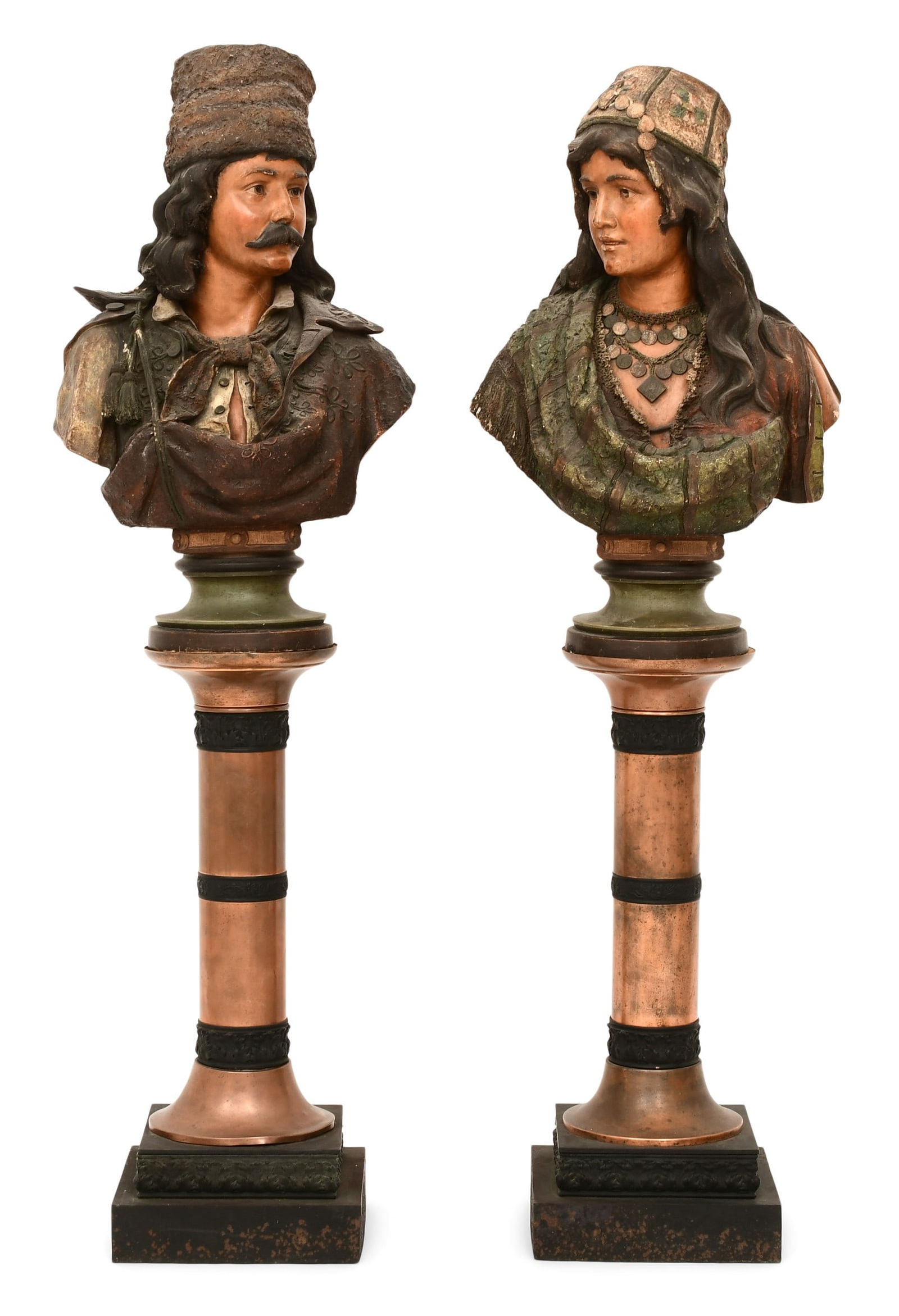 Pair of Polychrome-Painted Terracotta Busts of a Balkan Man and Woman: Pair of Polychrome-Painted Terracotta Busts of a Balkan Man and Woman late 19th century each supported by mixed metal pedestals, the woman numbered "545, 33" and the man numbered "544, 33" 54 1/2 x