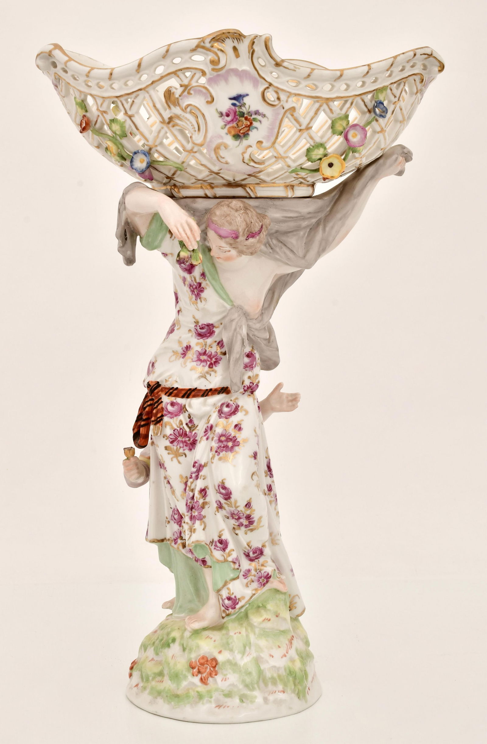 Berlin (K.P.M.) Figural Porcelain Centerpiece: Berlin (K.P.M.) Figural Porcelain Centerpiece early 20th century decorated with a woman and child below a floral decorated basket, signed with blue scepter mark 15 3/4 x 9 1/2 x 6 1/2 inches