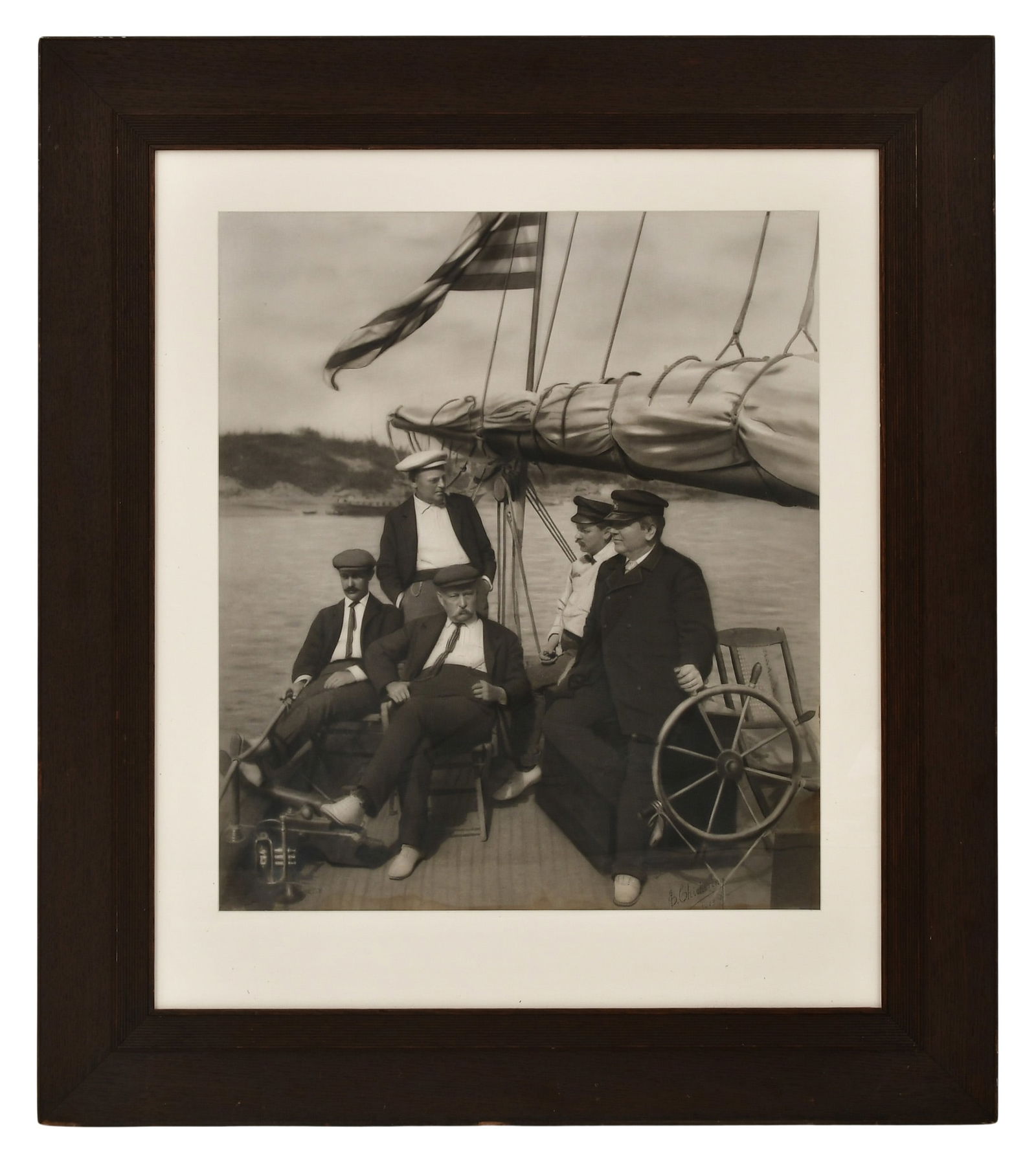 Elmer Chickering (1857-1915), Photograph of Men on a Sailboat: Elmer Chickering (1857-1915), Photograph of Men on a Sailboatcirca 1903signed and dated "E. Chickering, 1903"24 x 20 1/4 inches (sight)37 1/2 x 32 1/2 inches (frame)