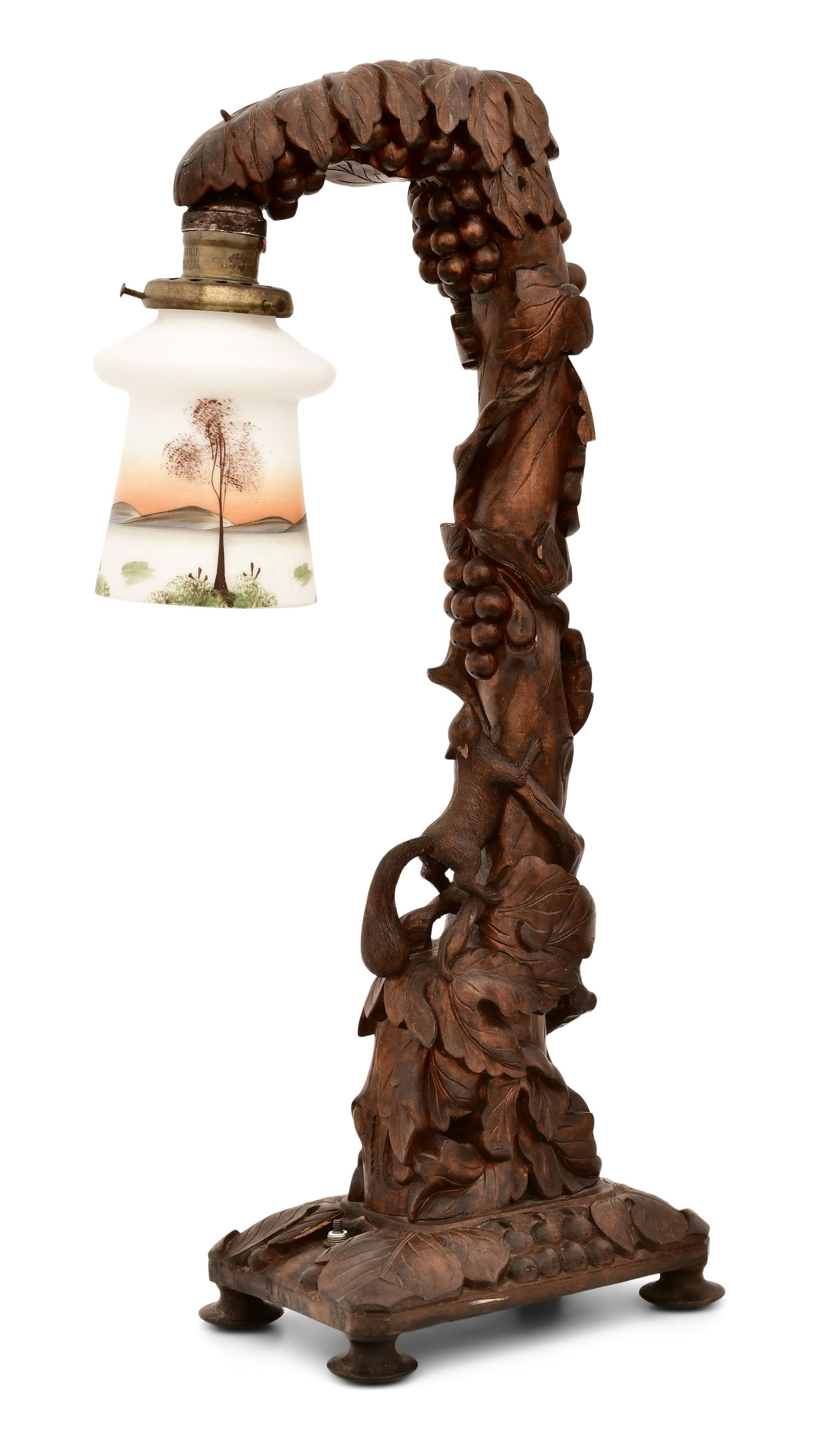 A Carved Walnut Bridge Lamp with Squirrel and Scenic Art Glass Shade: A Carved Walnut Bridge Lamp with Squirrel and Scenic Art Glass Shade circa 1900 22 x 10 x 5 1/2 inches