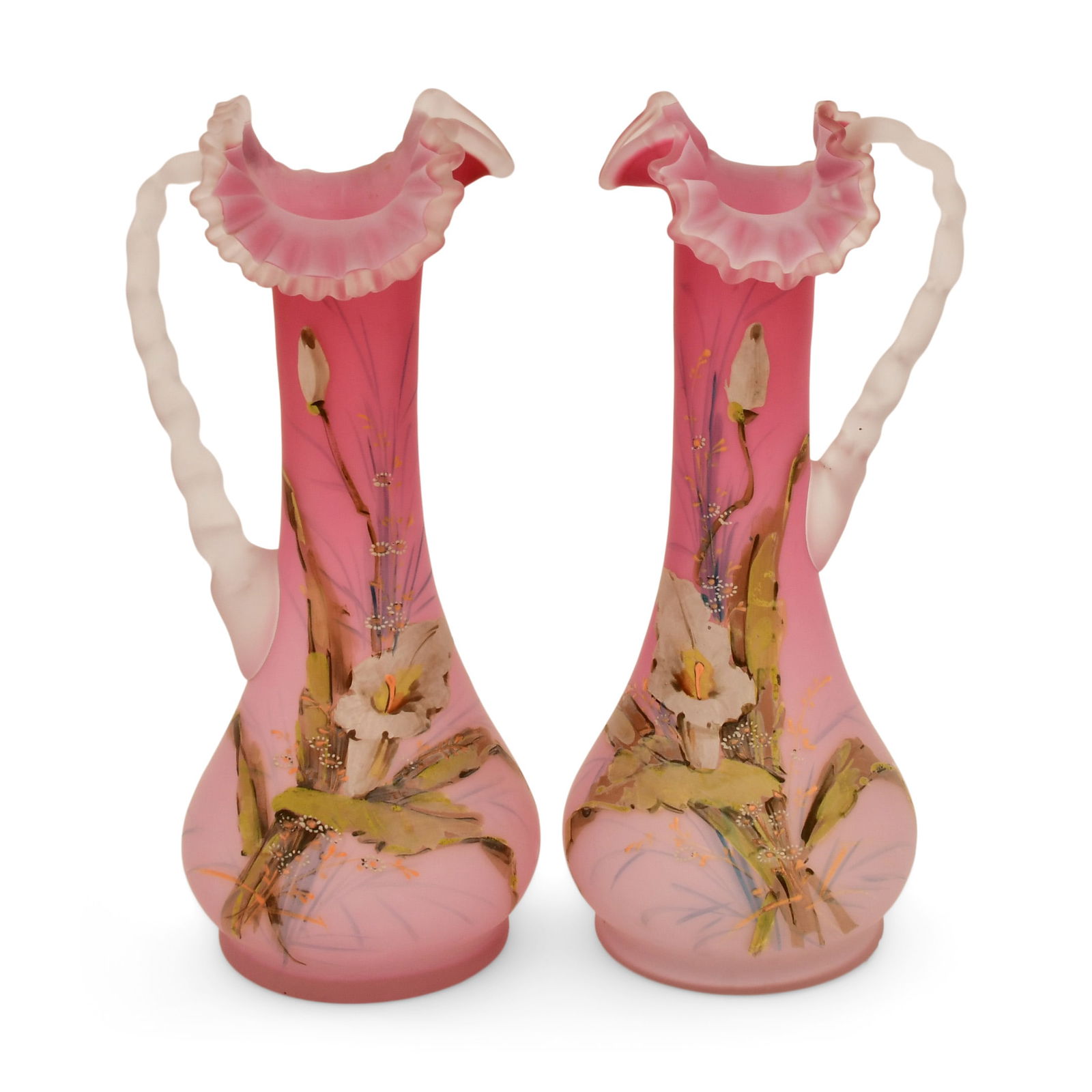 A Pair of Victorian Enamel-Decorated Satin Glass Floral Ewers: A Pair of Victorian Enamel-Decorated Satin Glass Floral Ewers19th century13 1/4 x 6 x 5 1/2 inches