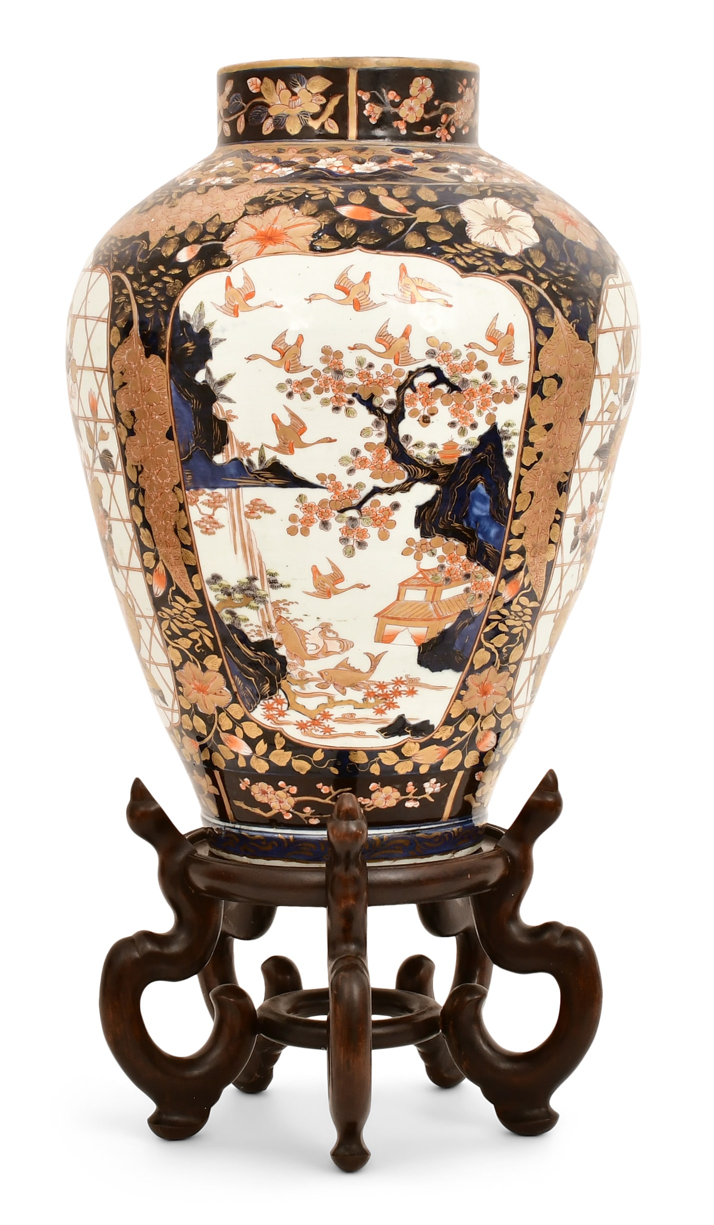 Japanese Imari Floor Vase: Japanese Imari Floor Vase late 19th century baluster form vase with a deep cobalt blue background, gilt and red lined filigree, has 3 panels, one with a large potted basket of peony flowers and the