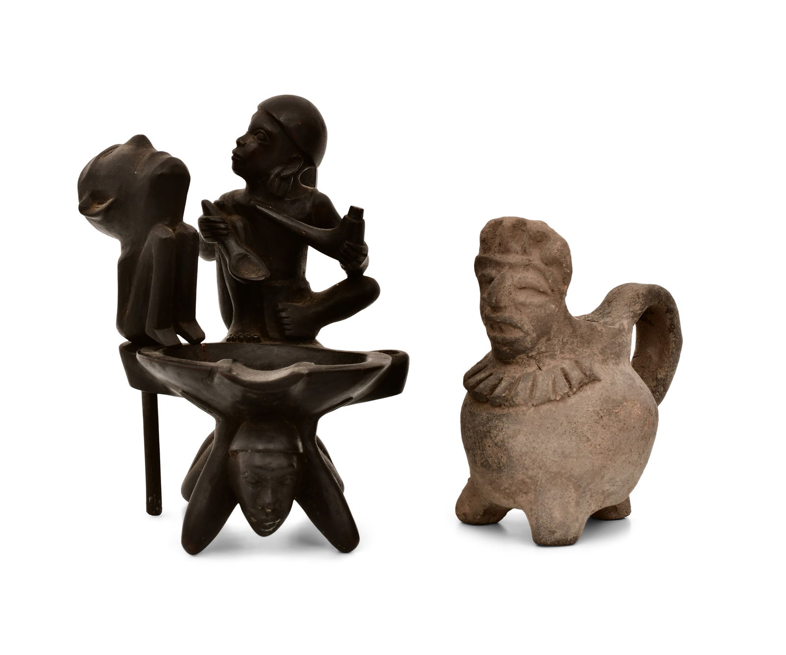 Pre-Columbian Ewer & African Carved Wood Pipe Stand: Pre-Columbian Ewer & African Carved Wood Pipe Stand 4 1/4 x 2 1/2 x 3 1/4 inches (ewer) 6 x 4 x 4 1/2 inches (pipe) Other Notes: Fontaine's Auction Gallery can arrange shipping for this item (USA